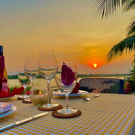 Bel Marina Hoi An Resort Εξωτερικό φωτογραφία Sunset at the Riverine Restaurant