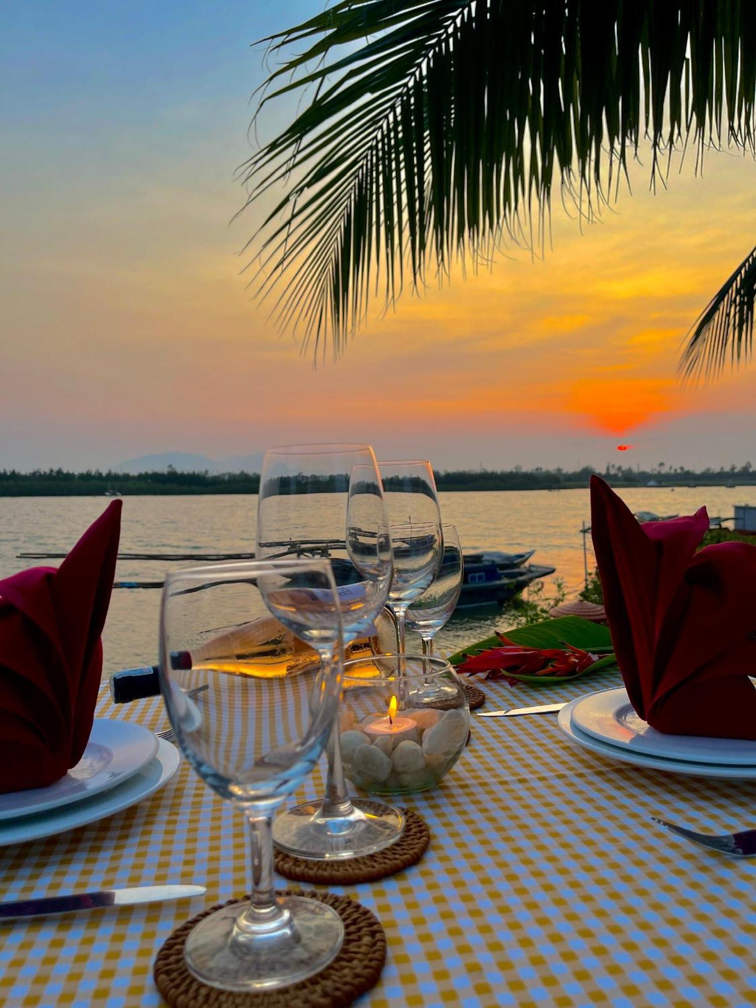 Bel Marina Hoi An Resort Εξωτερικό φωτογραφία Sunset at the Riverine Restaurant