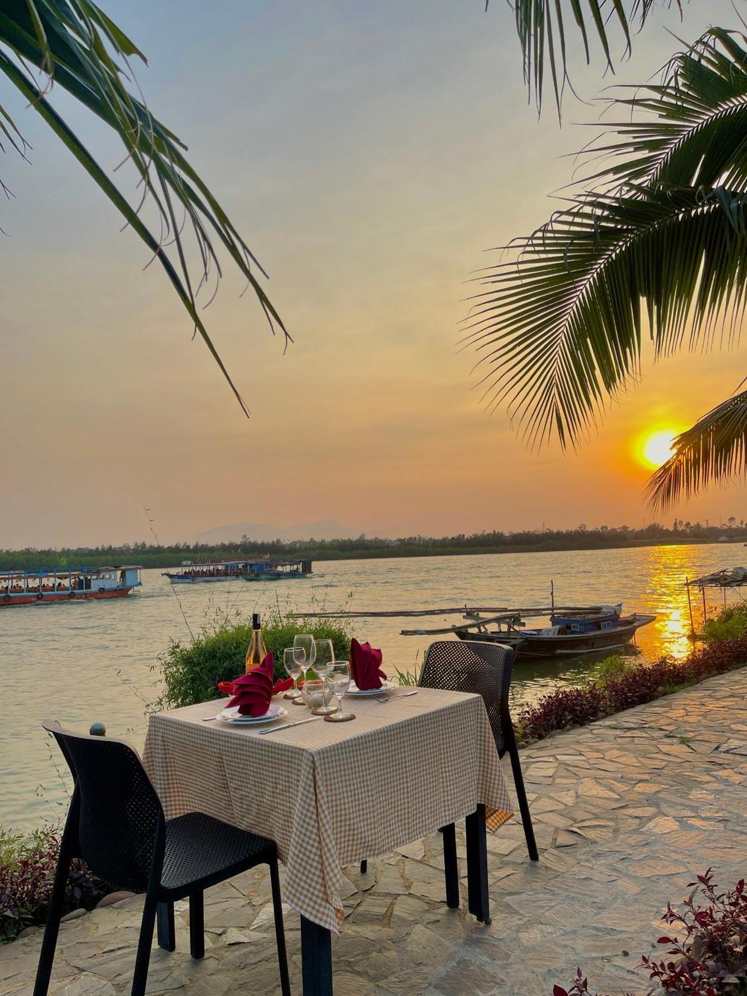 Bel Marina Hoi An Resort Εξωτερικό φωτογραφία Sunset at the Riverine Restaurant